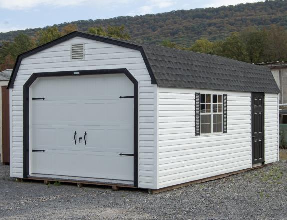 White and Black One-Car Garage With Gambrel Roof