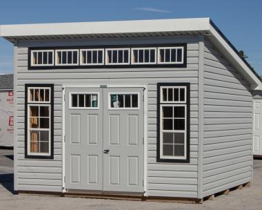 10x12 Lean To Studio Storage Shed with Grey Vinyl Siding and Black Trim Around The Windows