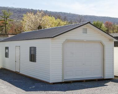 14x36 Peak Style One-Car Garage with Vinyl Siding and Metal Roofing From Pine Creek Structures