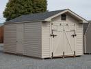 10x16 Peak Style Shed with Rampage Door And Pebble Clay Vinyl Siding