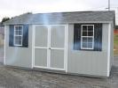 Pine Creek 10x16 HD Peak with Light Gray walls, White trim and Black shutters, and Oyster Gray shingles